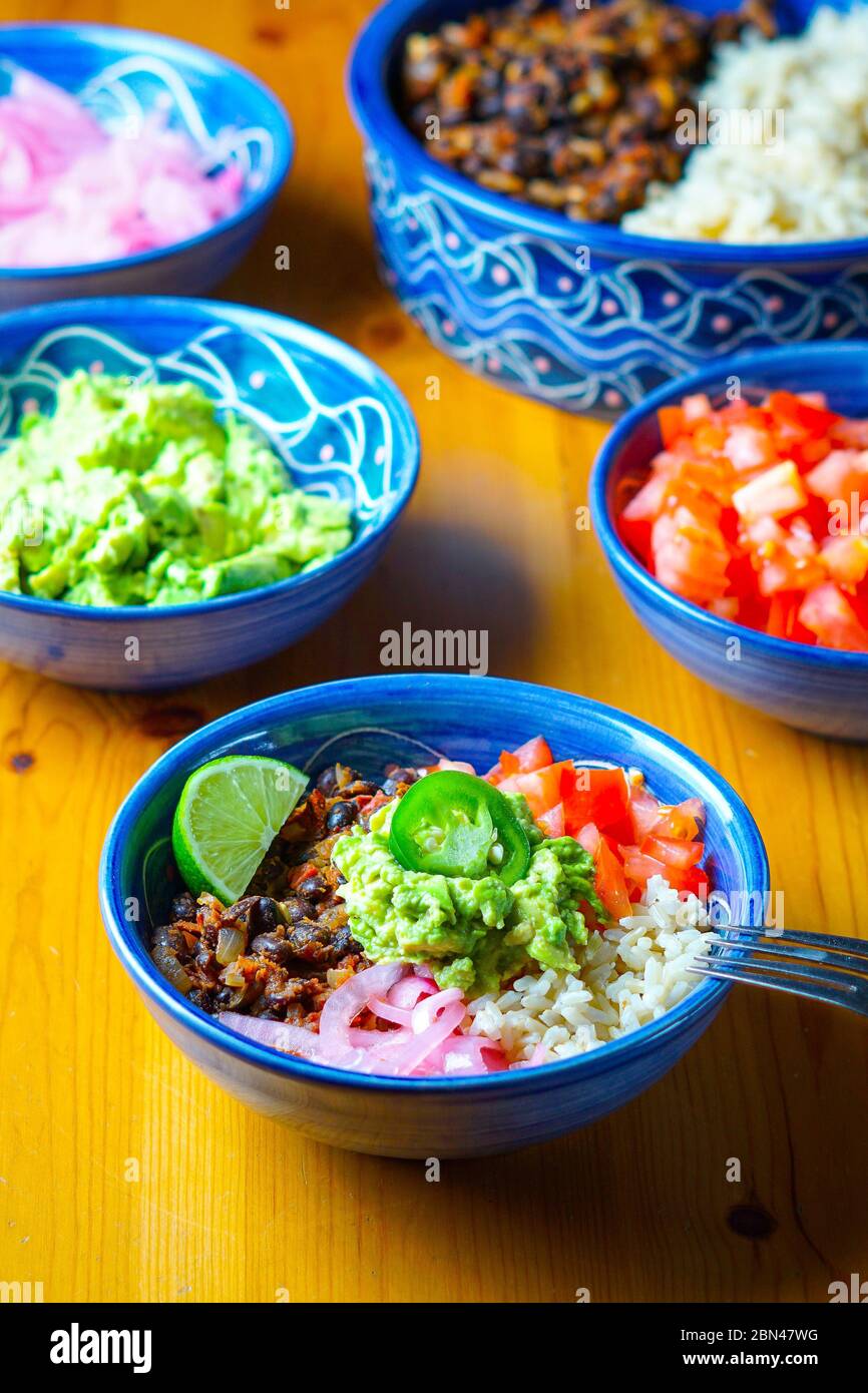 Burrito bowls with brown rice Stock Photo Alamy