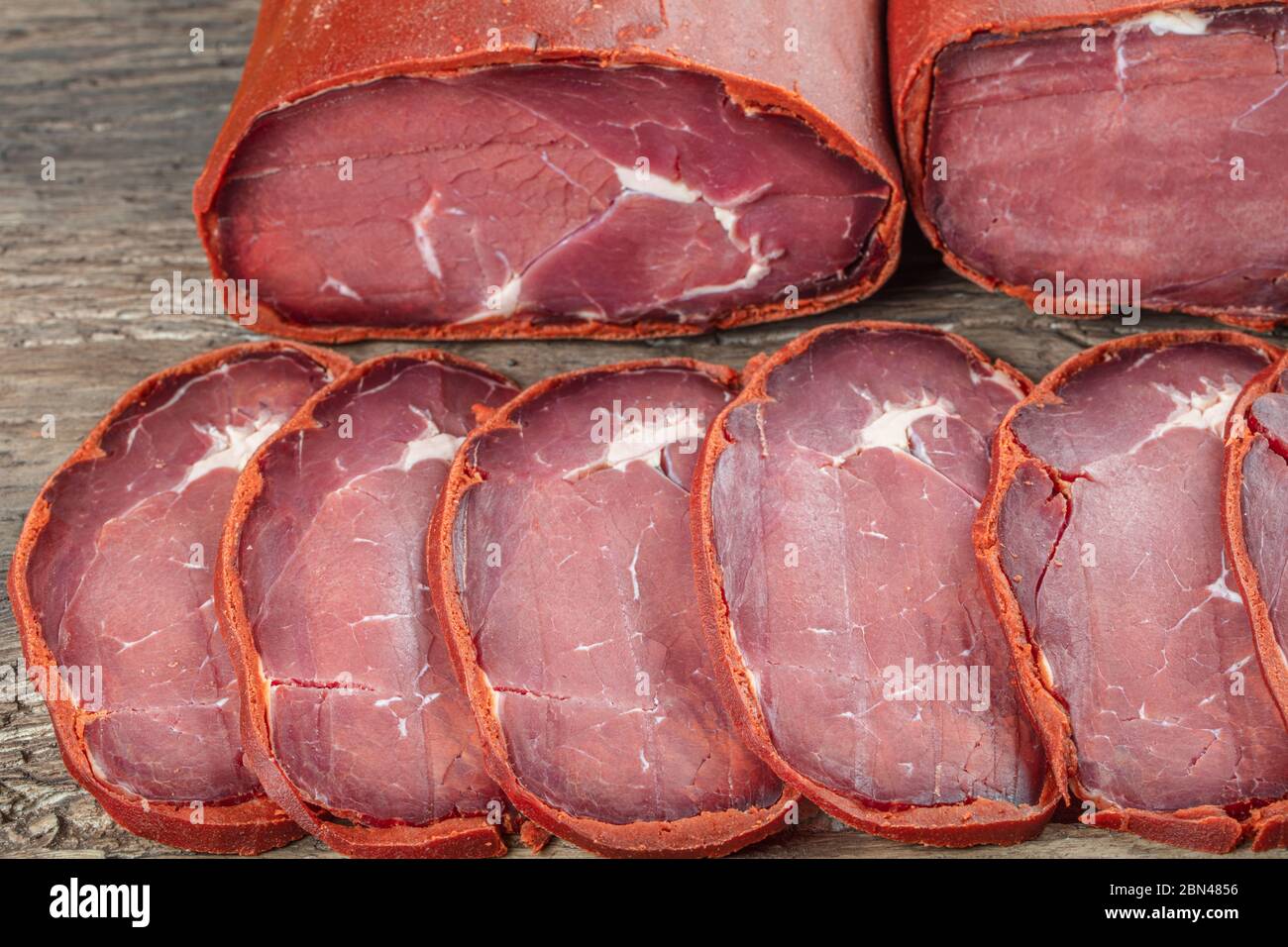 A piece of cecina from Leon (air dried and smoked cured beef made from the  hind leg of cattle from León, Spain Stock Photo - Alamy