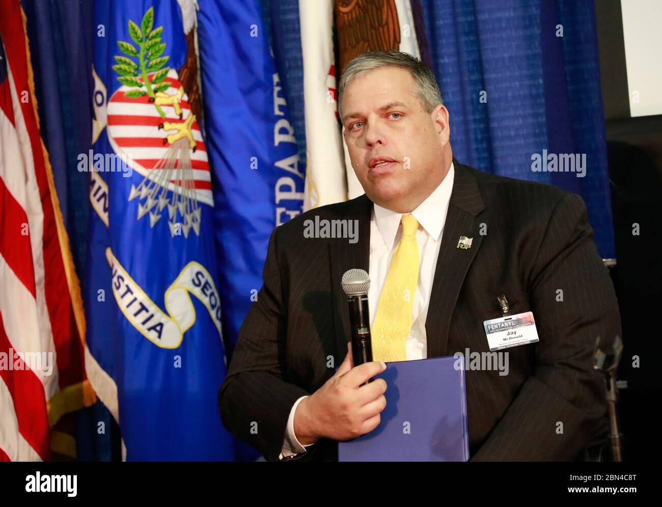 Key members of federal law enforcement, fire and emergency medical services attend the preview release of the Fentanyl: The Real Deal video created by U.S. Customs and Border Protection and partner agencies  in the Bureau of Justice Assistance, Office of Justice Washington D.C., Vice President Fraternal Order of Police, Jay McDonald discusses the importances of law enforcement, and the roll they play in securing the nation.  August 30, 2018 U.S. Customs and Boarder Protection Stock Photo