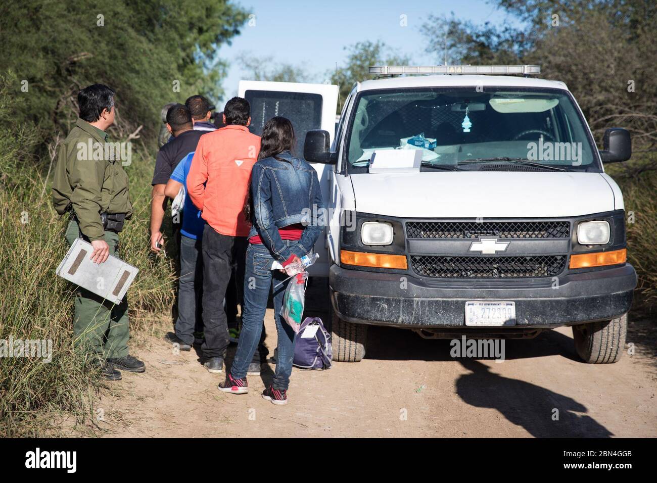 U.S. Border Patrol agents arrest illegal aliens attempting to enter the
