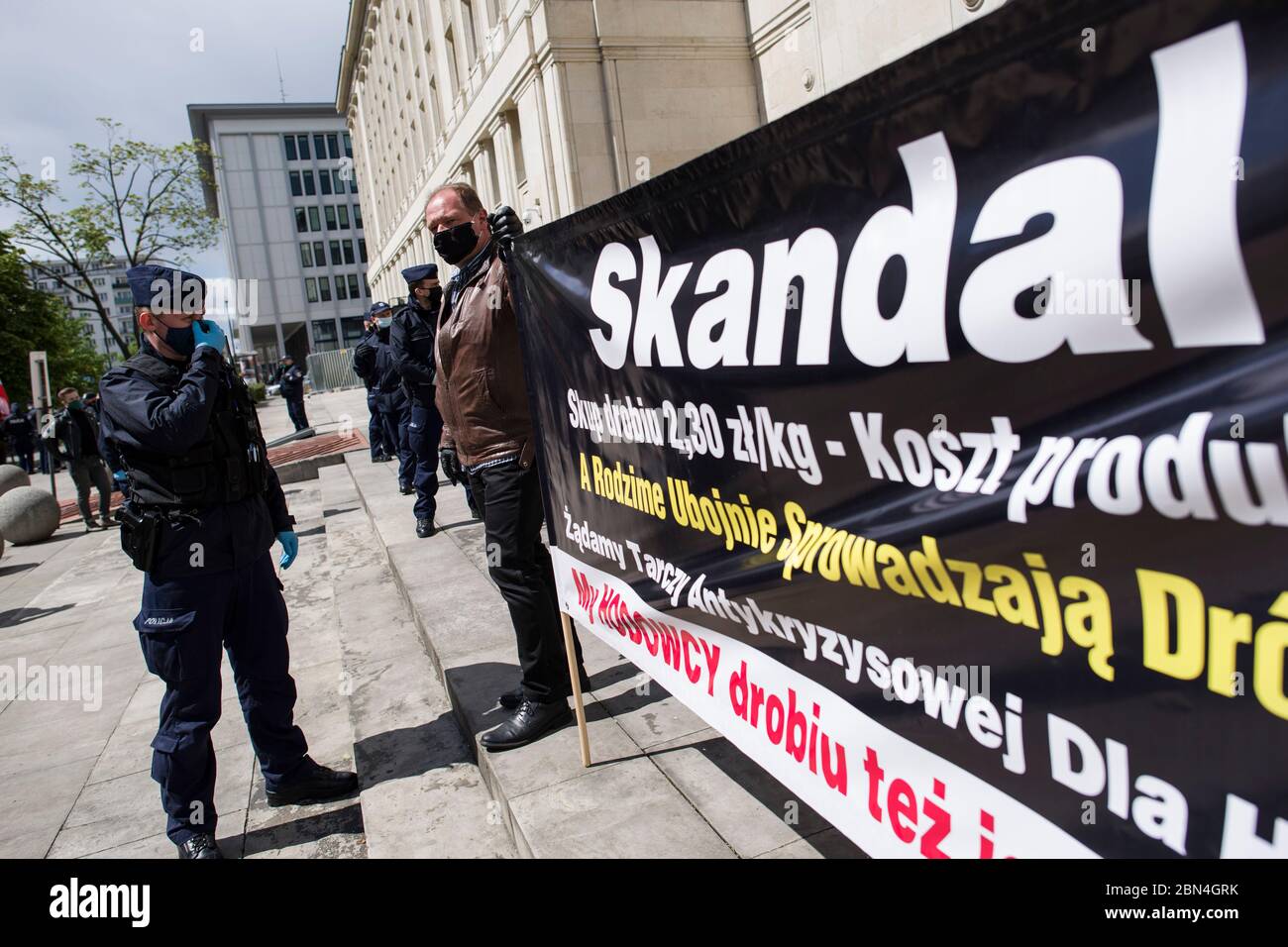 A Farmer Holding A Banner Being Instructed By A Policeman During The Campaign Leader Of Agro Union Organization Agro Unia Michal Kolodziejczak Came To Warsaw As He Claimed To Thank The Minister