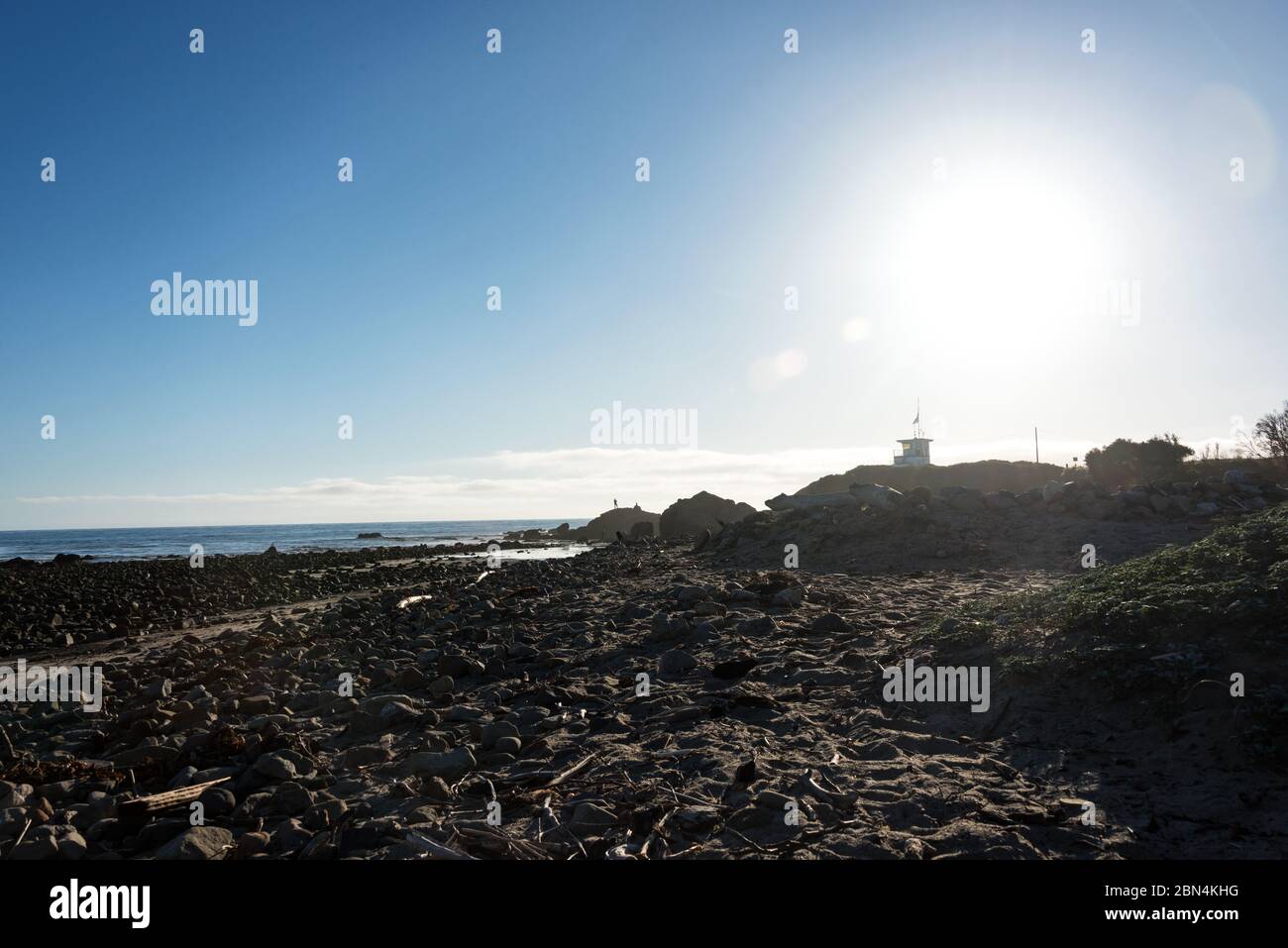 Late afternoon sun behind the Leo Carrillo State Park lifeguard station, Malibu, California. Stock Photo