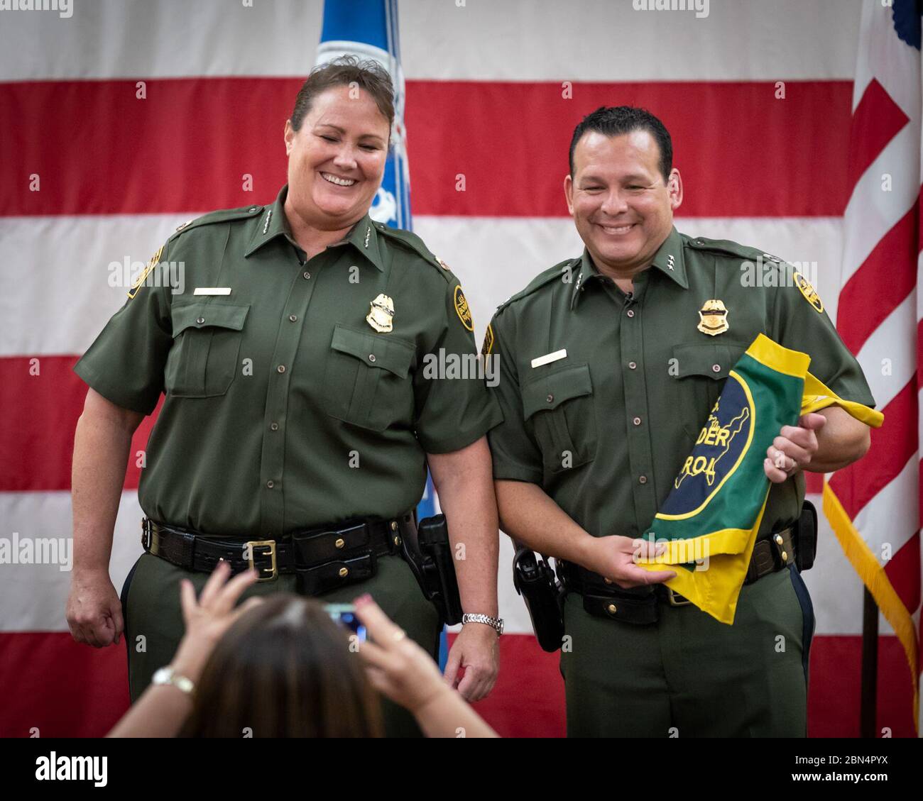 U.S. Border Patrol Chief Carla Provost smiles for a picture with the new Tucson Sector Chief