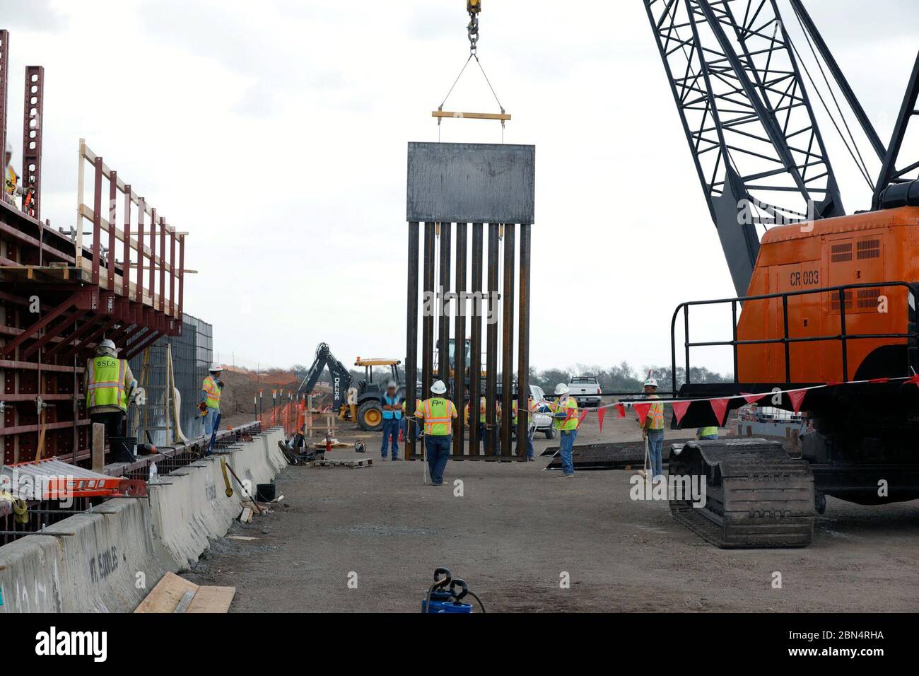 On October 30, 2019, construction workers placed border wall panels in ...