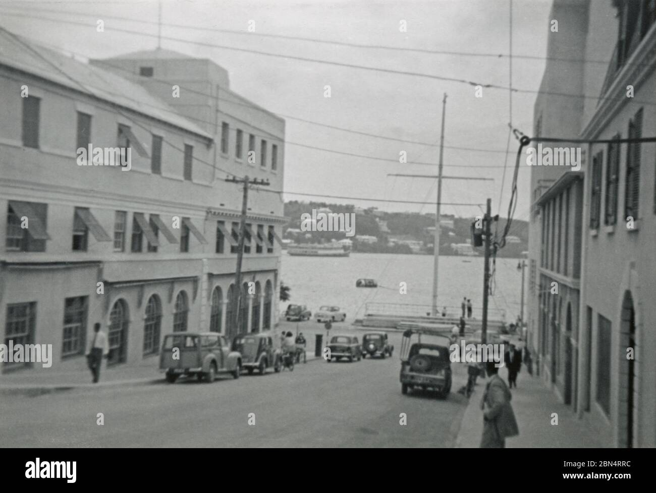 Vintage photograph, from Burnaby Street looking toward the flagpole on Front Street in Hamilton, Bermuda on October 30, 1955. Taken by a passenger debarked from a cruise ship. SOURCE: ORIGINAL PHOTOGRAPH Stock Photo
