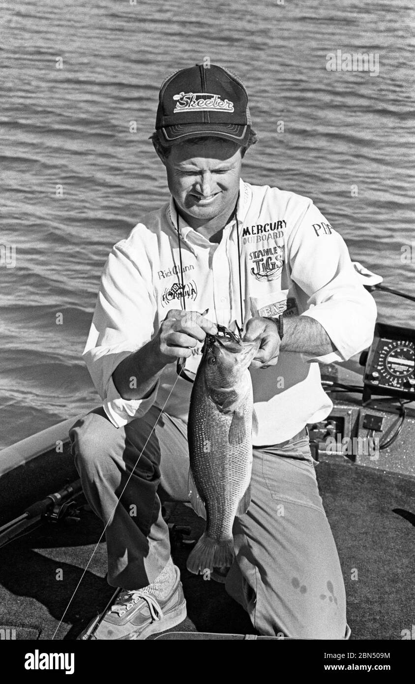 Legendary professional bass fisherman Rick Clunn, with a largemouth bass on Lake Havasu, Arizona, circa 1985, during the 1985 Red Man All American Bas Stock Photo