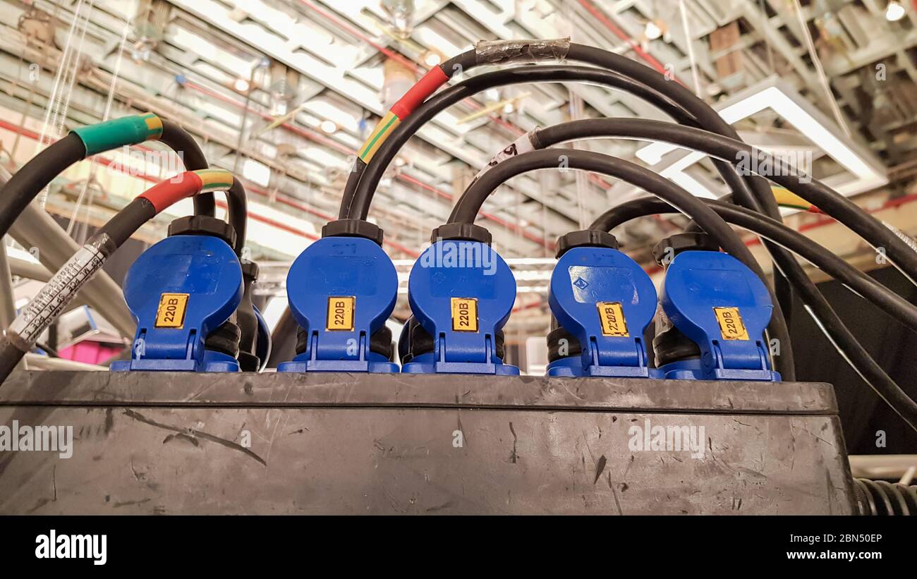 Plug in the power cord, many outlets with black plugs plugged in close