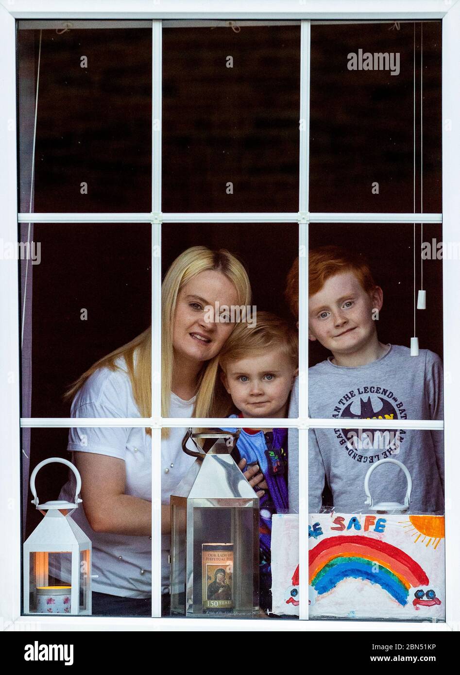 Saoirse McVeigh with her sons Sean Patrick (8) and Eion Michael (4) at their home in John Street, Belfast, celebrating International Nurses Day on the 200th birthday of Florence Nightingale. Stock Photo