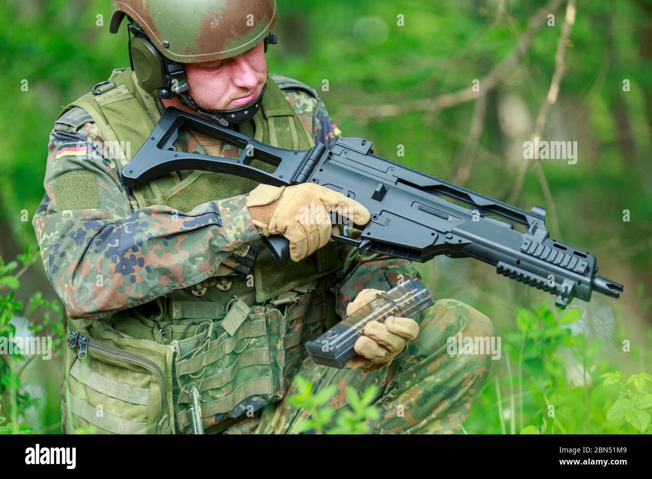 German Assistant Gunner German soldier with a german assault rifle Stock Photo - Alamy