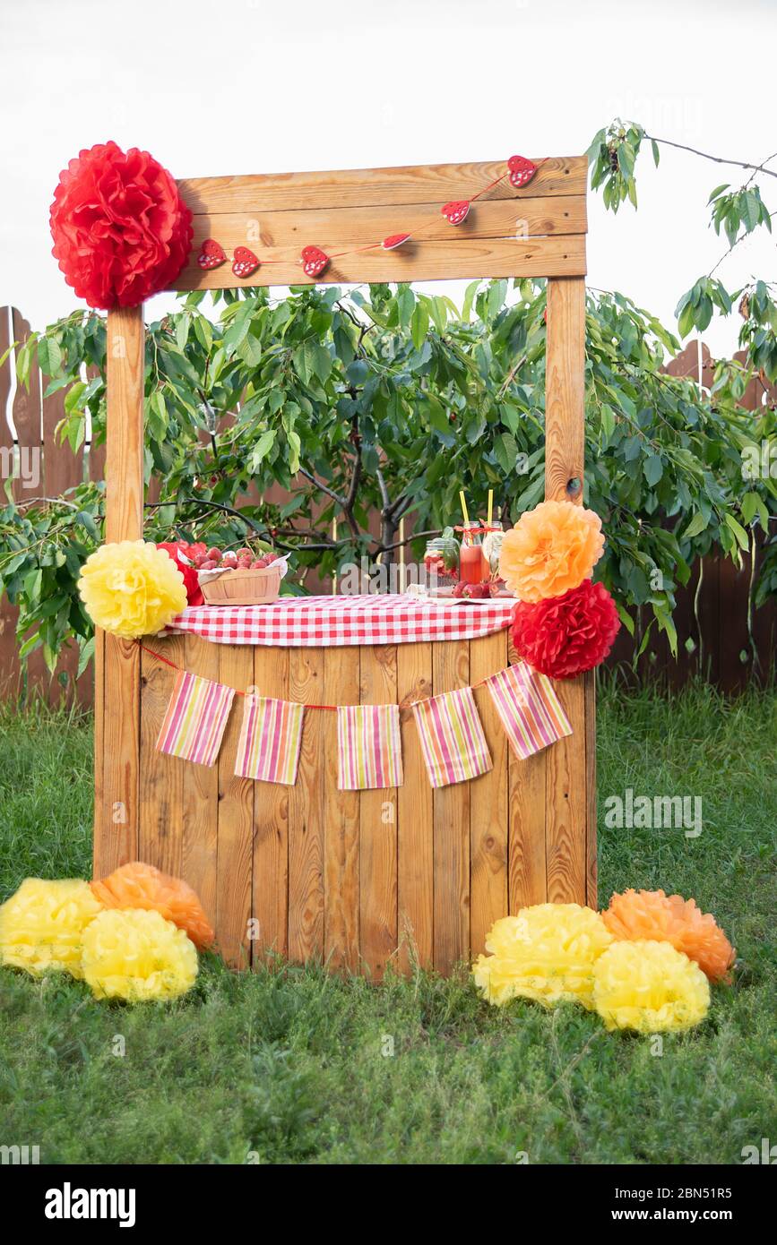 Lemonade Stand. strawberry lemonade with ice and mint as summer