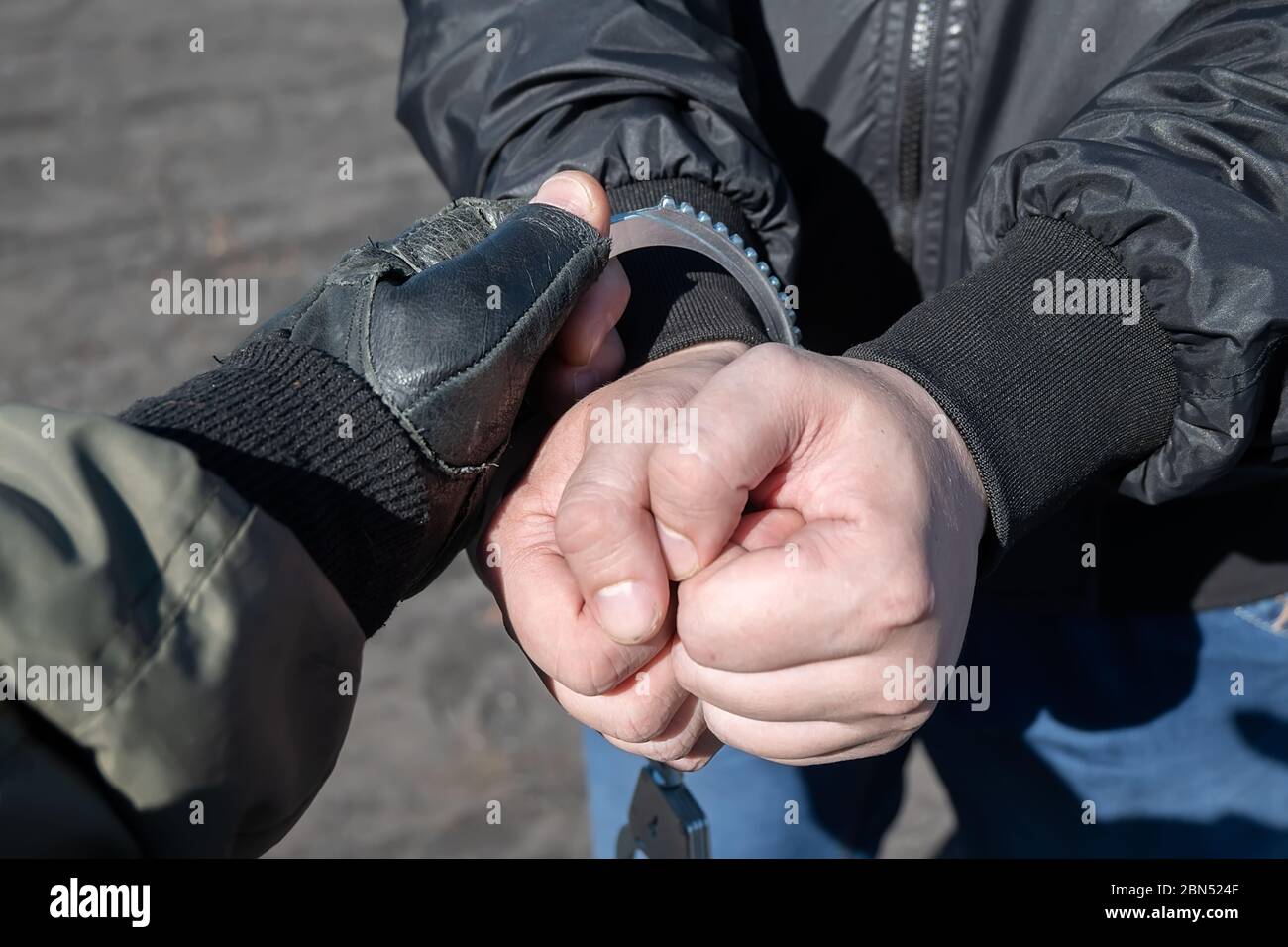 Man Handcuffs High Resolution Stock Photography and Images Alamy