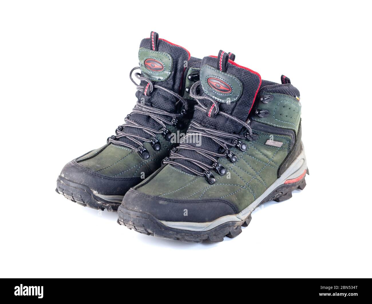 Pair of used hiking boots isolate on white background Stock Photo Alamy