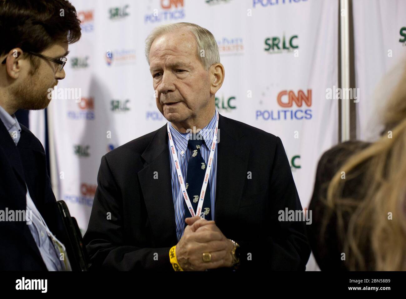 North Charleston South Carolina USA, January 19, 2012: Romney supporter Robert 'Bud' McFarland, a consultant for Republican presidential hopeful Mitt Romney, talks to the press in the spin room after the four remaining Republican presidential candidates squared off   at the CNN Debate. ©Bob Daemmrich Stock Photo