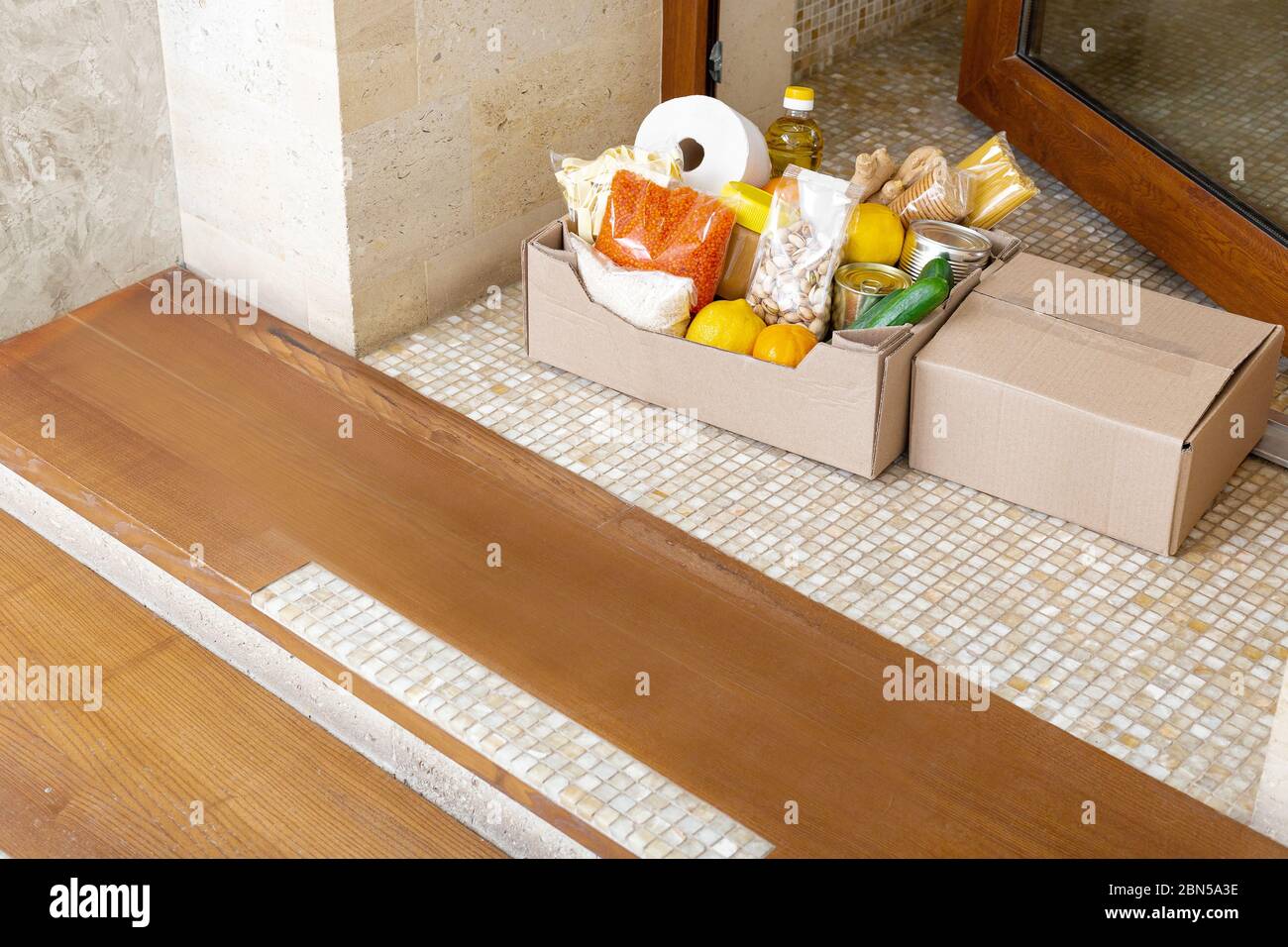 Boxes On Doorstep Of House High-Res Stock Photo - Getty Images