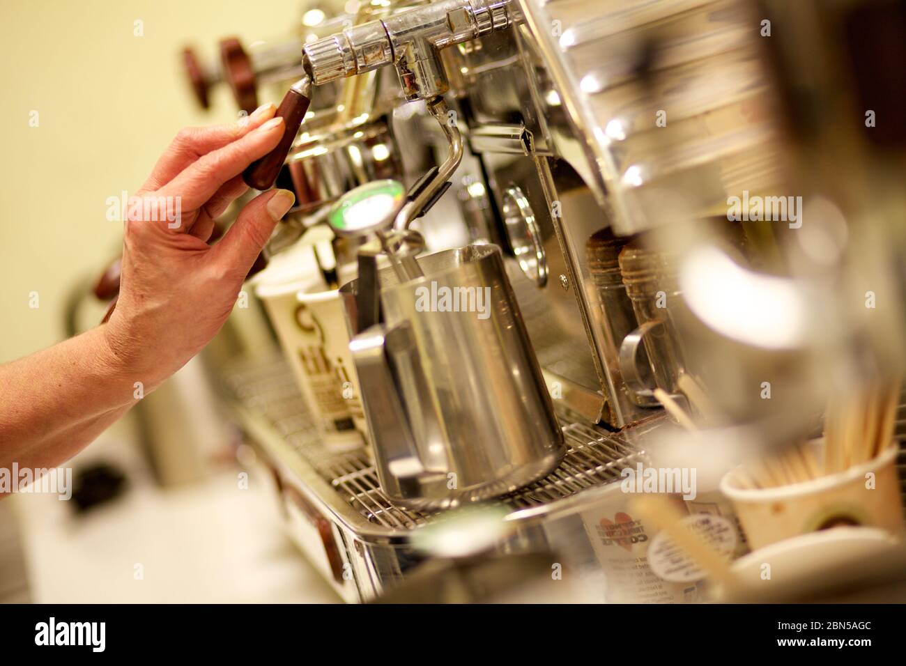 Coffee machine mechanics as a barista prepares a coffee Stock Photo Alamy