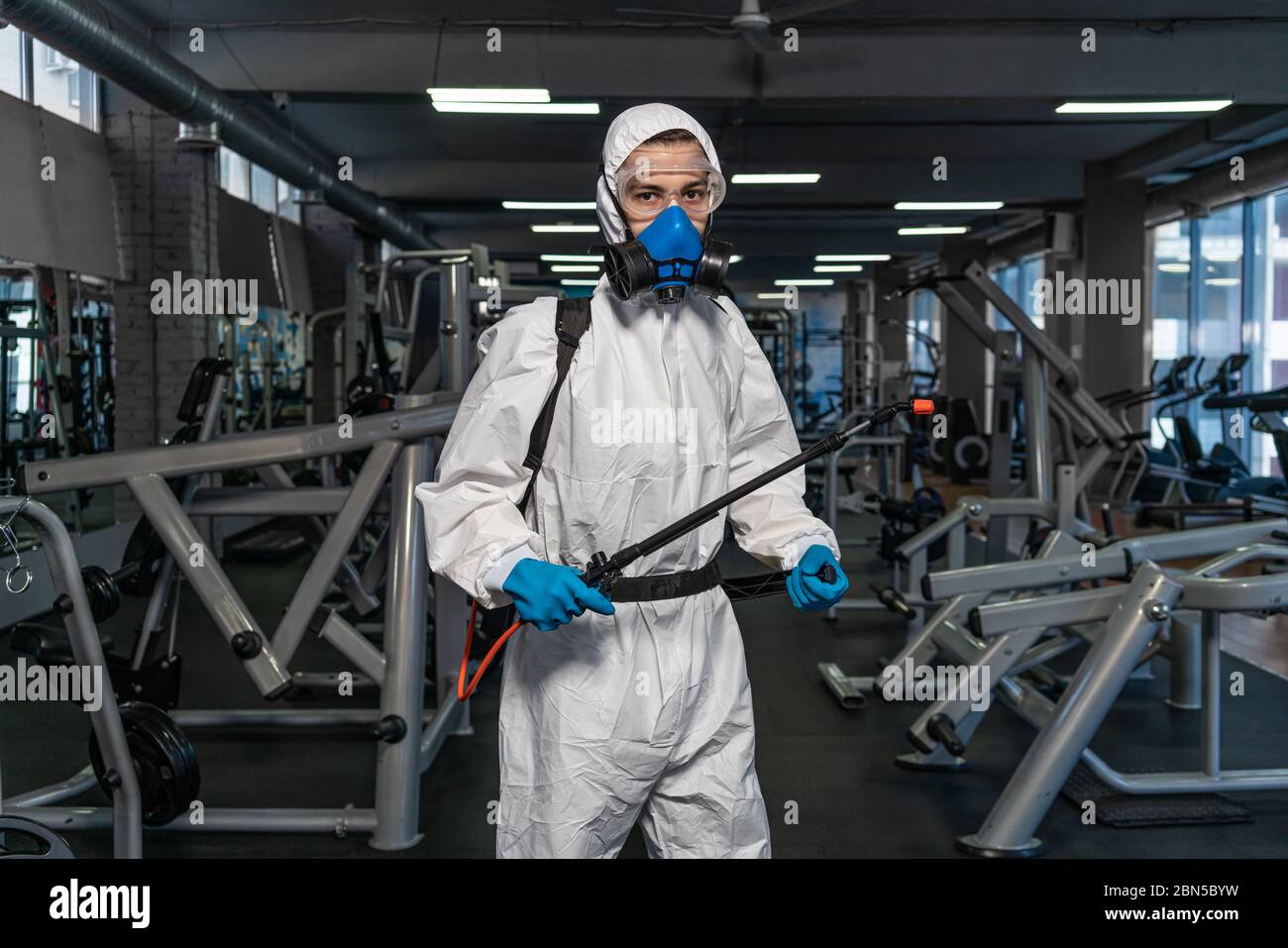 professional disinfector personal protective equipment ppe suit, gloves