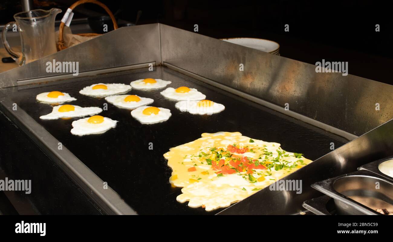 Fried and scrambled eggs and omelette station in a hotel or restaurant