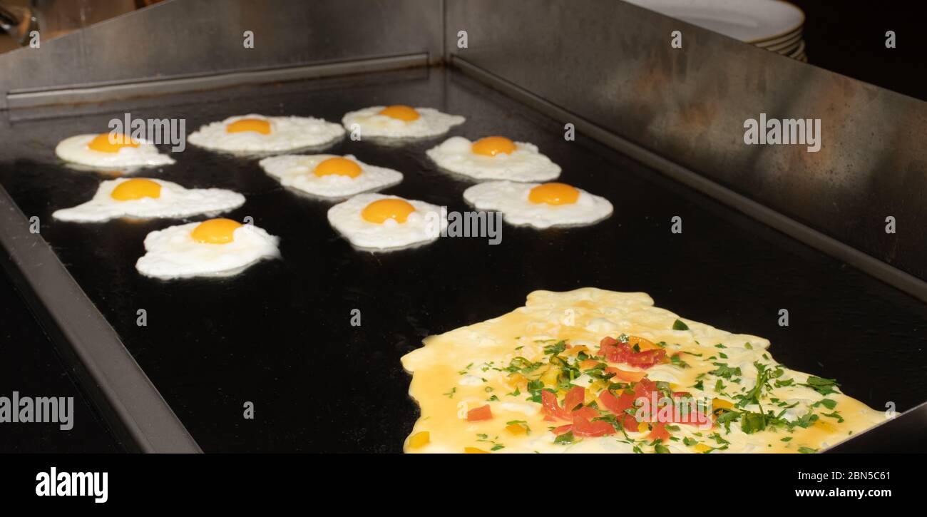 Fried and scrambled eggs and omelette station in a hotel or restaurant