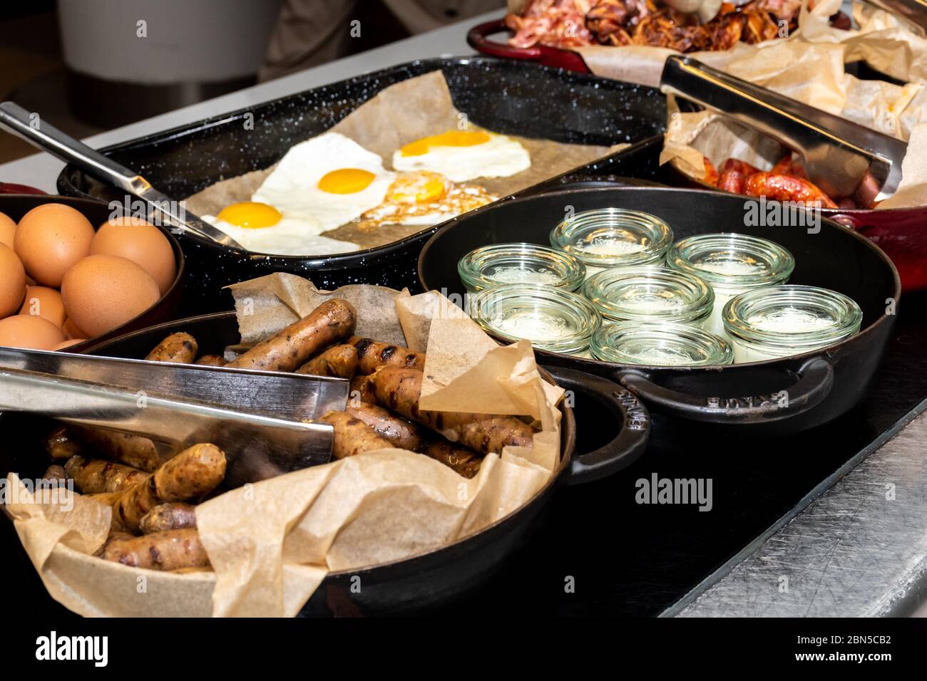 Selection of self service english continental breakfast buffet display,  catering or brunch table food buffet filled with all sorts of delicious  food Stock Photo - Alamy
