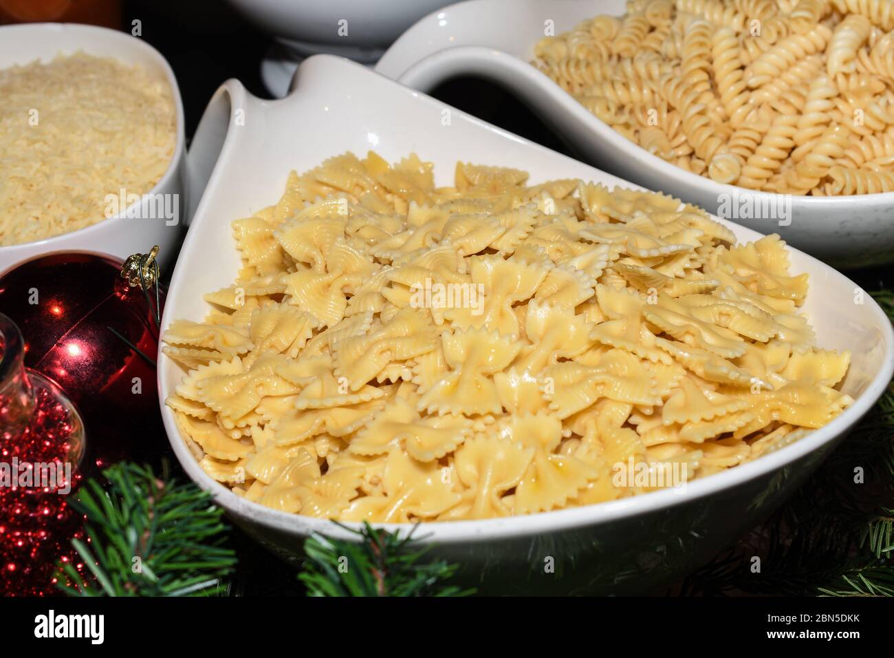 Fresh cooked simple no sauce pasta during brunch buffet Stock Photo Alamy
