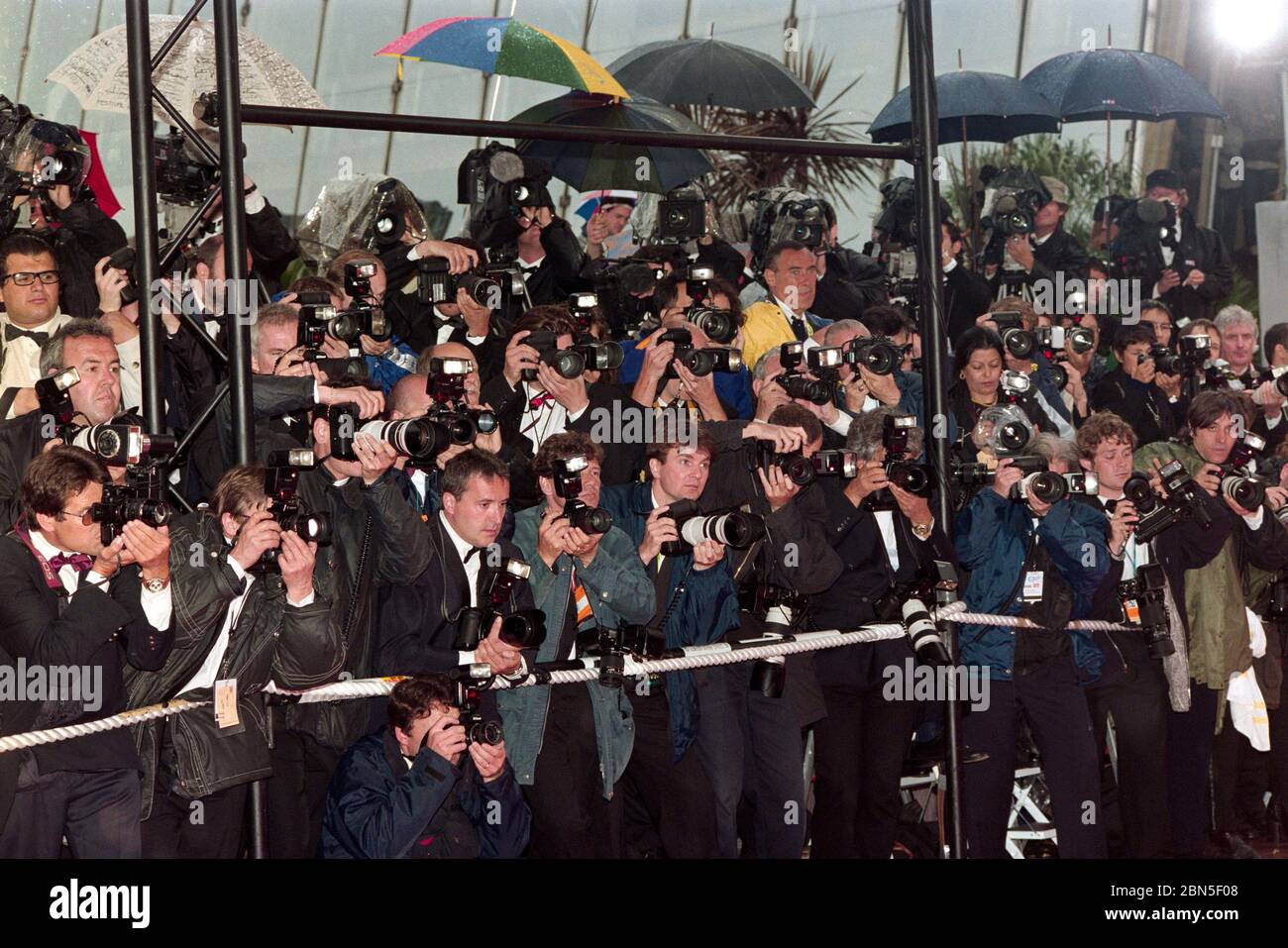 CANNES, FRANCE. May 1997: Photographers at the 50th Cannes Film Festival.  File photo © Paul Smith/Featureflash Stock Photo