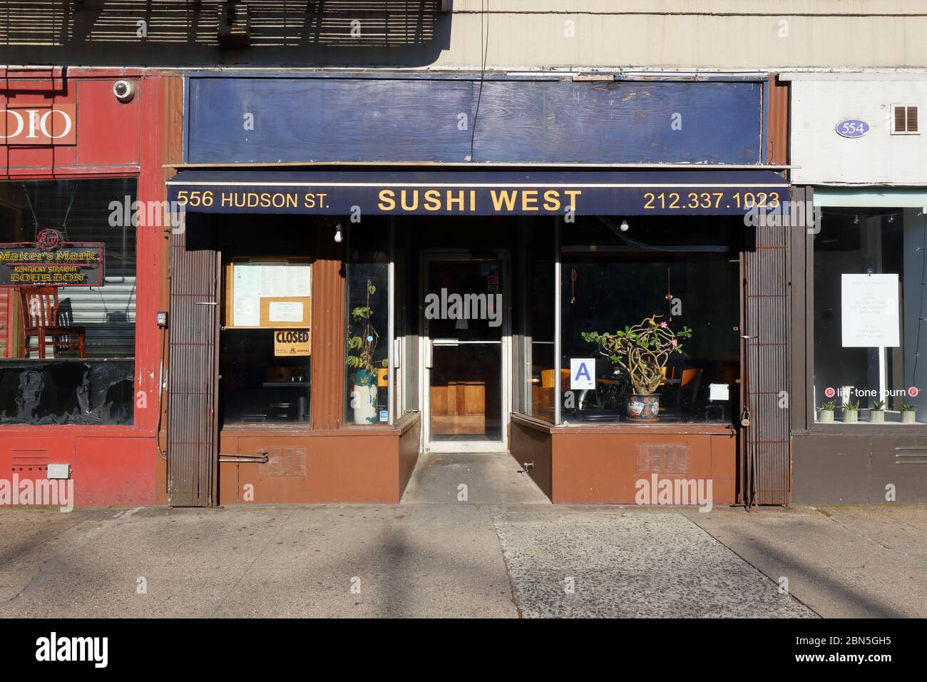 [historical storefront] Sushi West, 556 Hudson Street, New York, NYC storefront photo of a Japanese sushi restaurant in Manhattan's West Village. Stock Photo