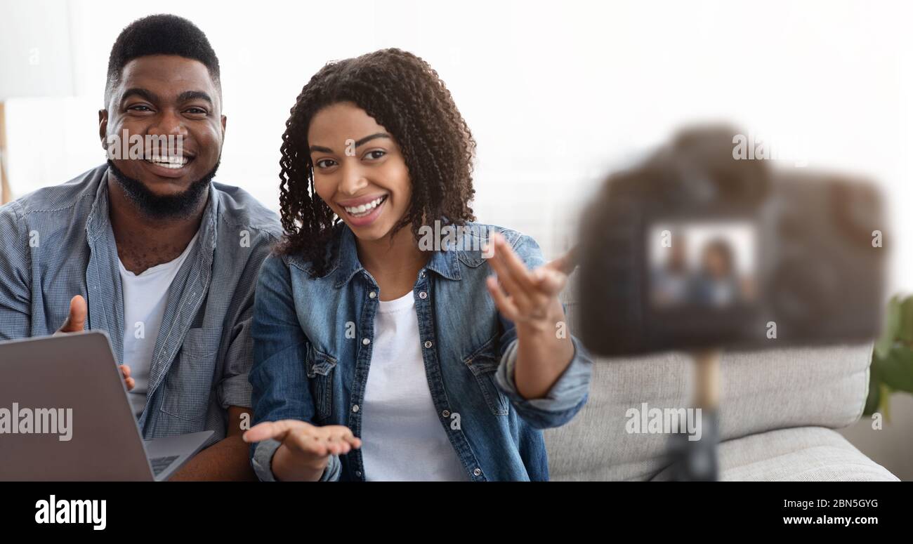 Happy Black Couple Recording Video For Their Relationship Blog In Internet Stock Photo
