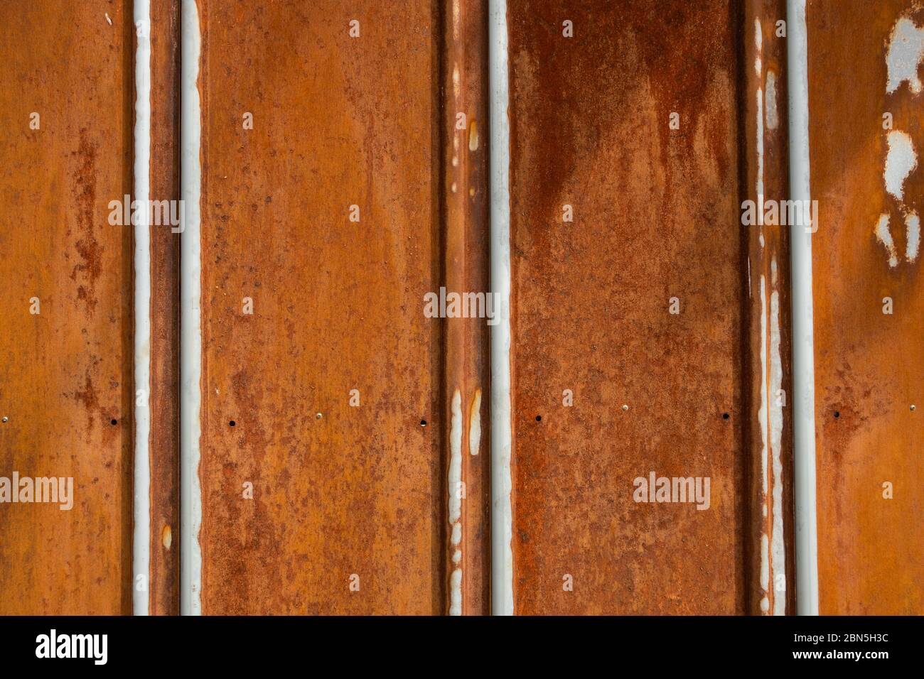 Red brown rusty metal plate wall texture background Stock Photo
