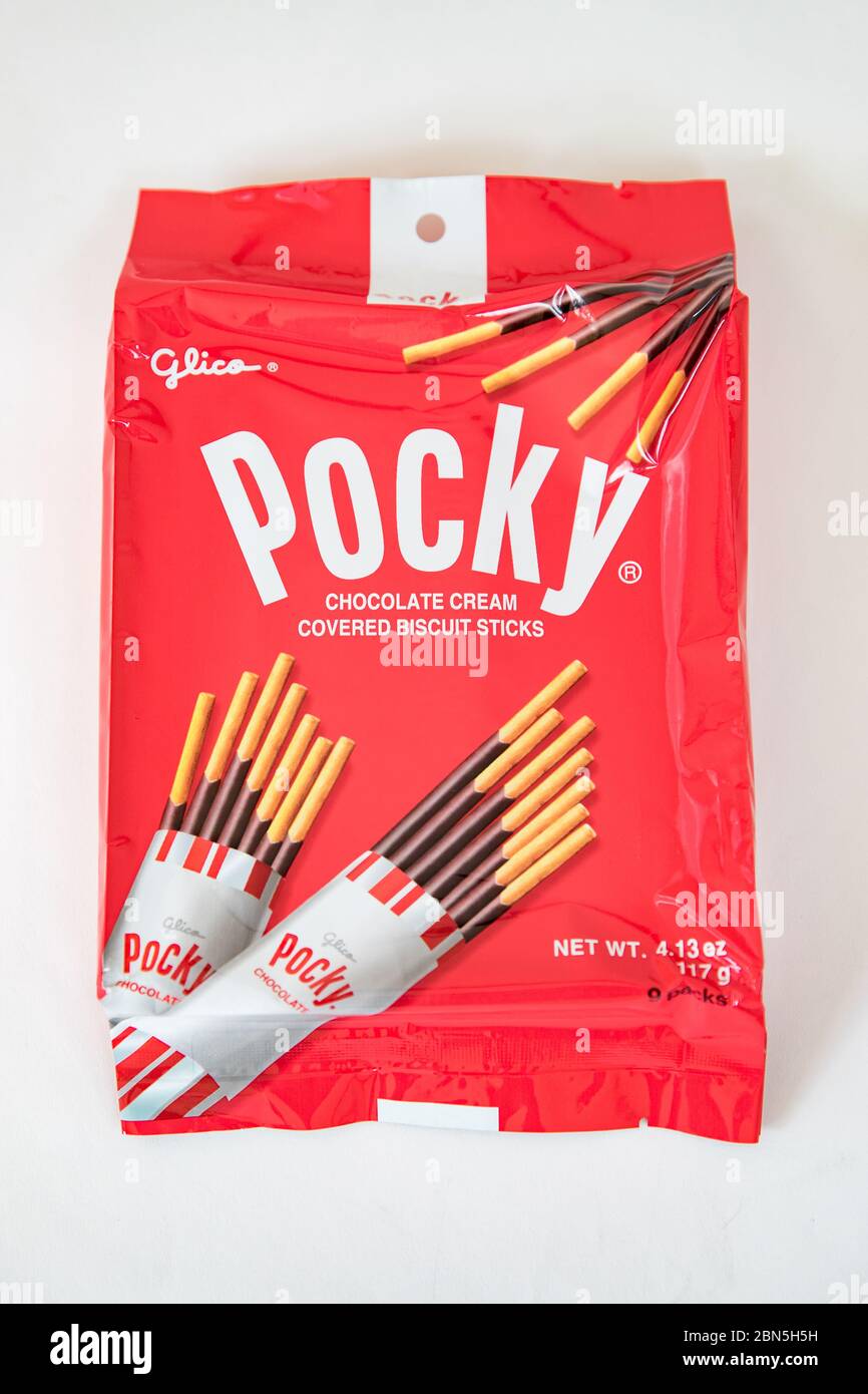 Princeton New Jersey May 12 2020: Pocky brand of chocolate sticks on white background. Pocky is a famous confectionery among Asian people. Stock Photo