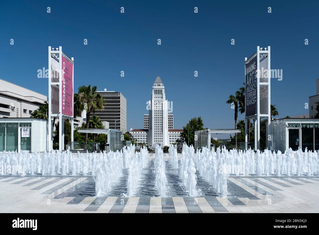 Los Angeles city hall building set behind a water fountain at the Music