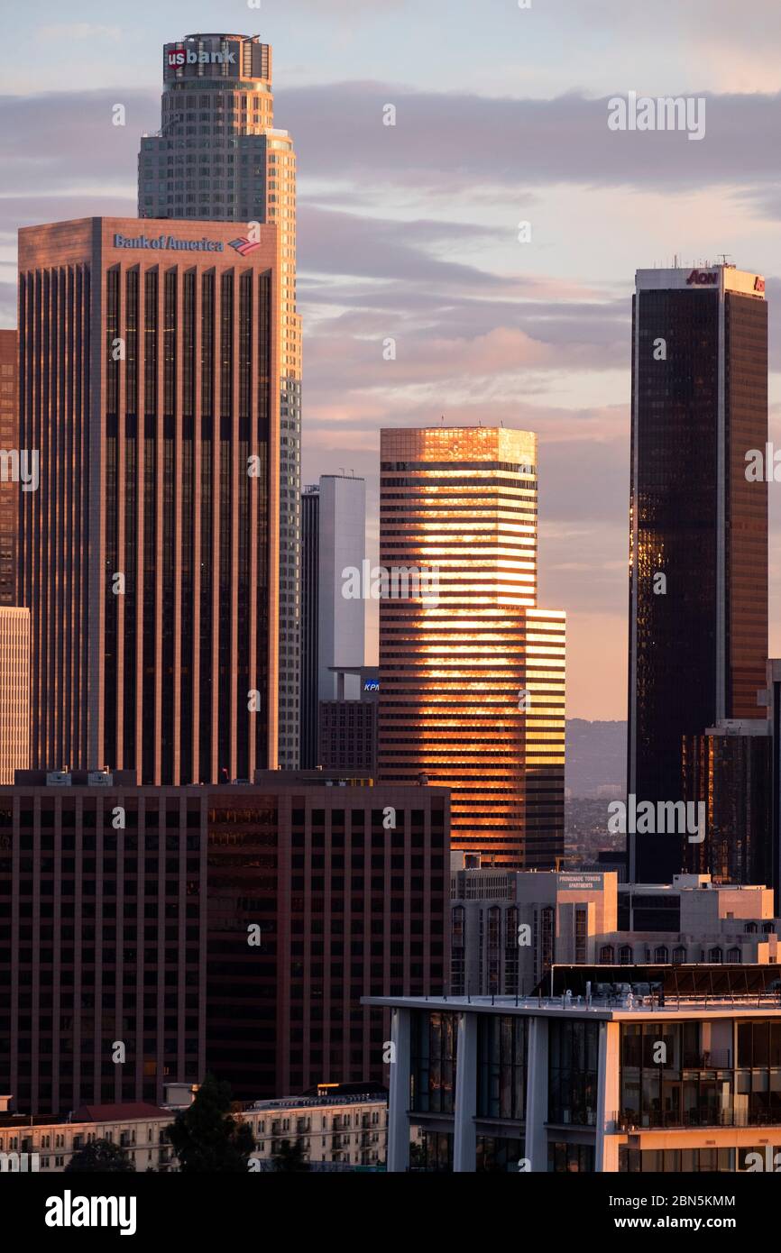 Bright silver reflections of a downtown Los Angeles skyscraper at sunset Stock Photo
