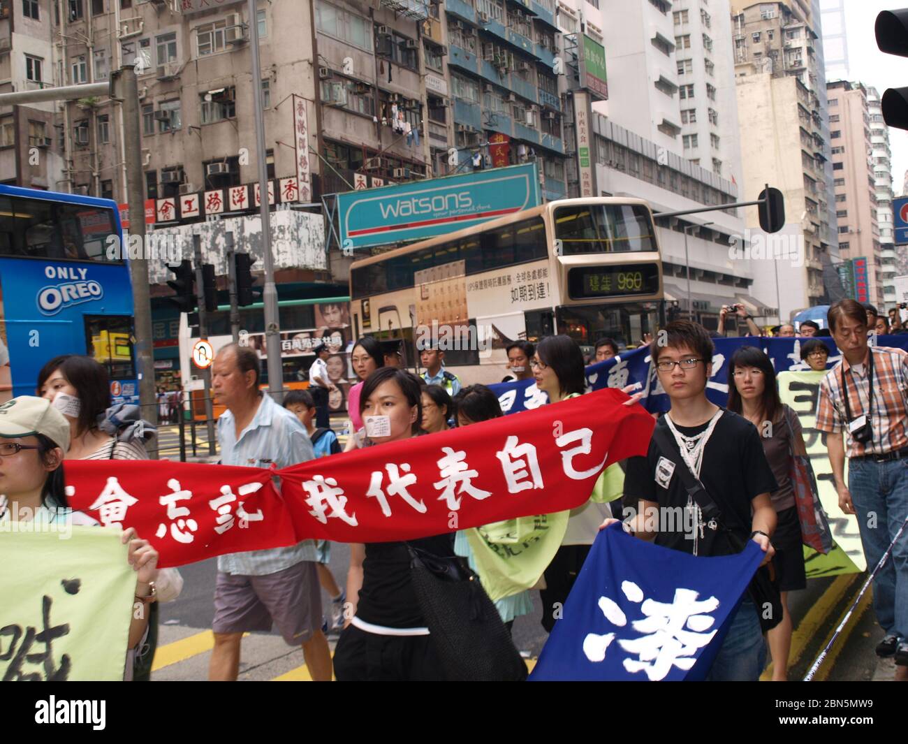A peaceful march in Hong Kong street to mark the anniversary of the crackdown on the pro-democracy student-led protesters in Beijing. Stock Photo