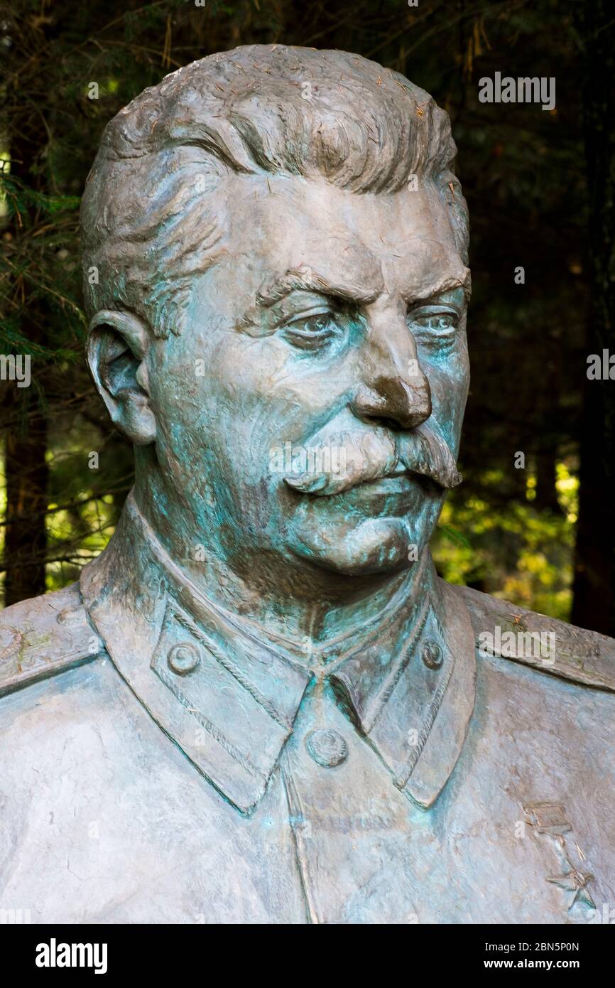 A close up of a bronze sculpture head of Stalin. At Gruto Parkas near Druskininkai, Lithuania. Stock Photo
