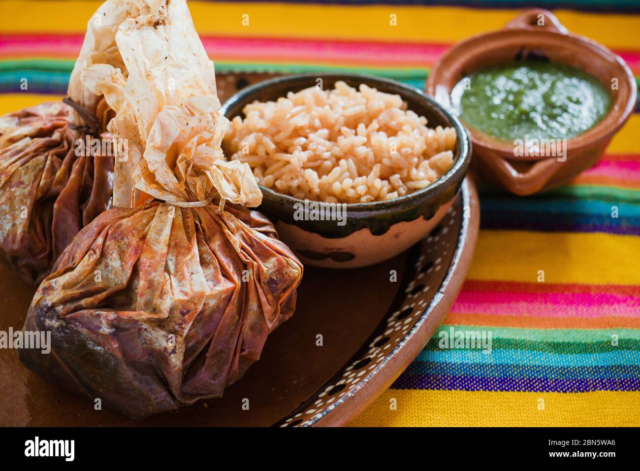 Mixiotes food in mexico, Mexican beef or lamb wrap spicy Stock
