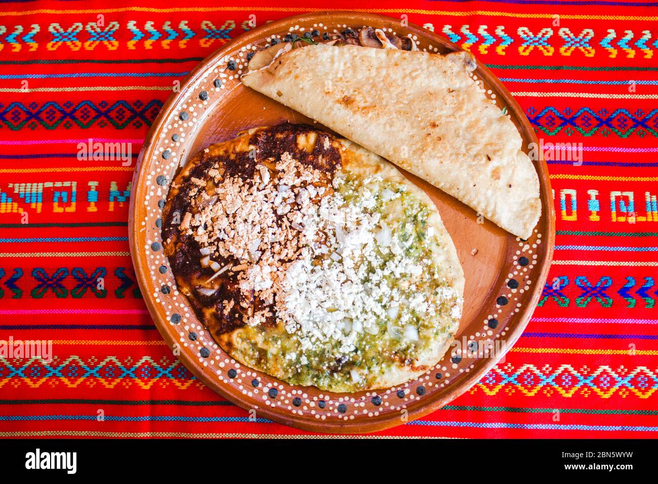 mexican quesadilla with squash blossom, cheese and sauce in mexico city