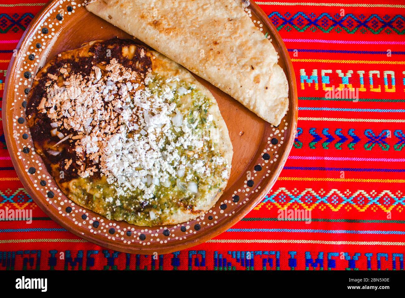 mexican quesadilla with squash blossom, cheese and sauce in mexico city