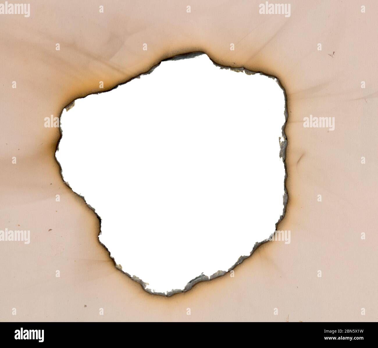 Burnt Hole In A Paper Stock Photo Alamy