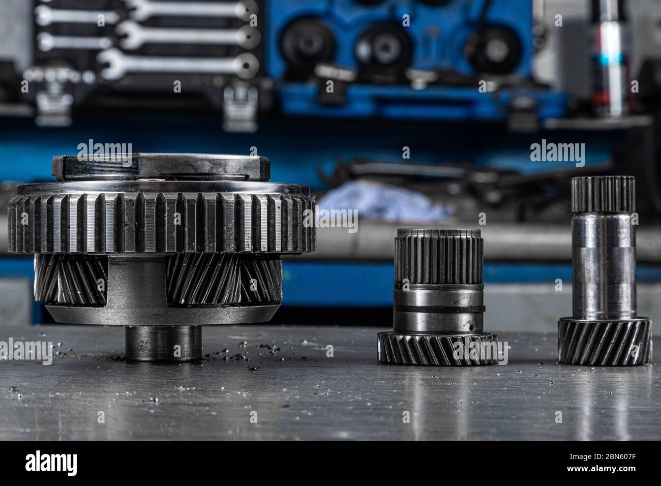 Set of various engine and gearbox spare parts. Shiny gears for