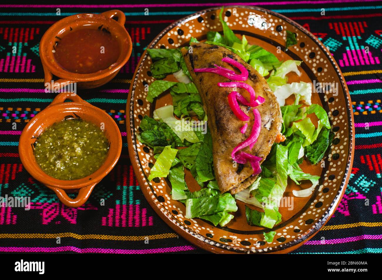 quesadilla frita con salsas, pescadilla mexican spicy fried food in mexico city Stock Photo