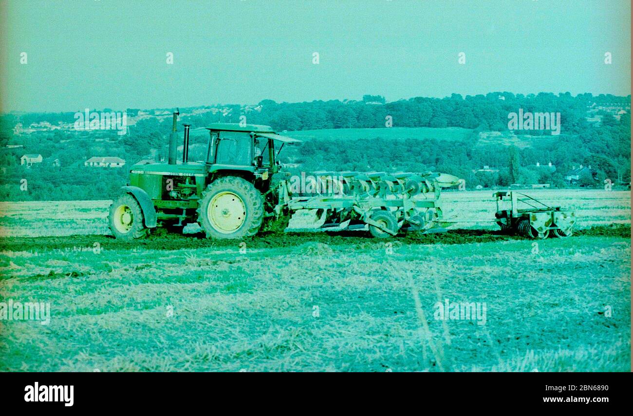 Tractor at work, ploughing fields, Wakefield, west Yorkshire, Northern England, in 1997 Stock