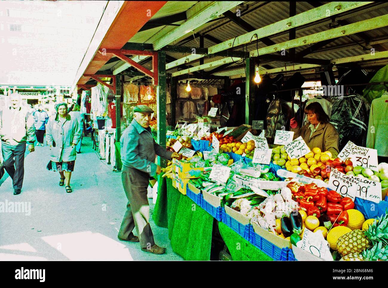 1997 people shopping Wakefield town centre market , west Yorkshire, Northern England, shot on film & cross processed Stock Photo