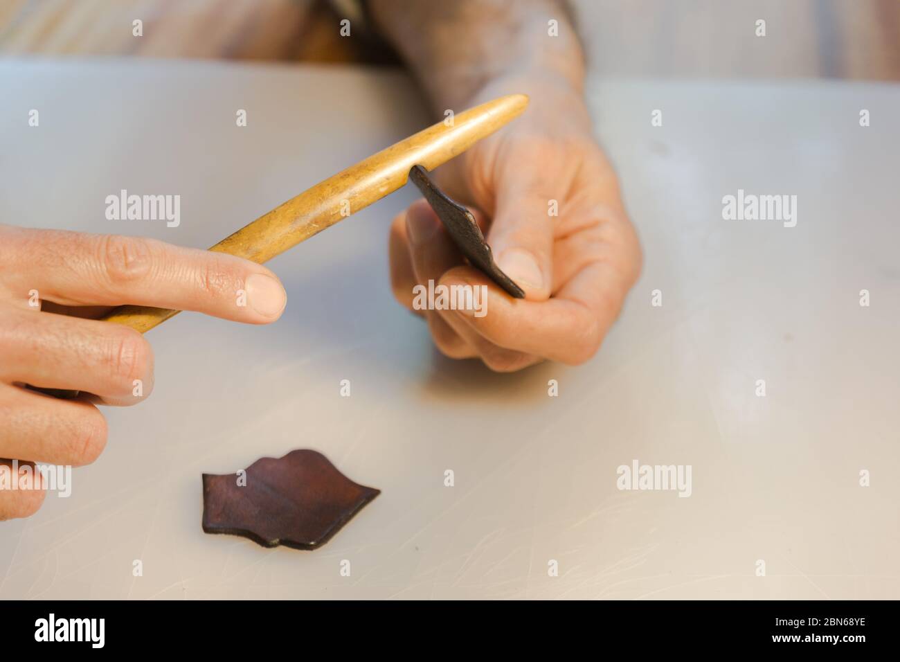 Leather edge burnishing, leather edge finishing by handmade tools. The