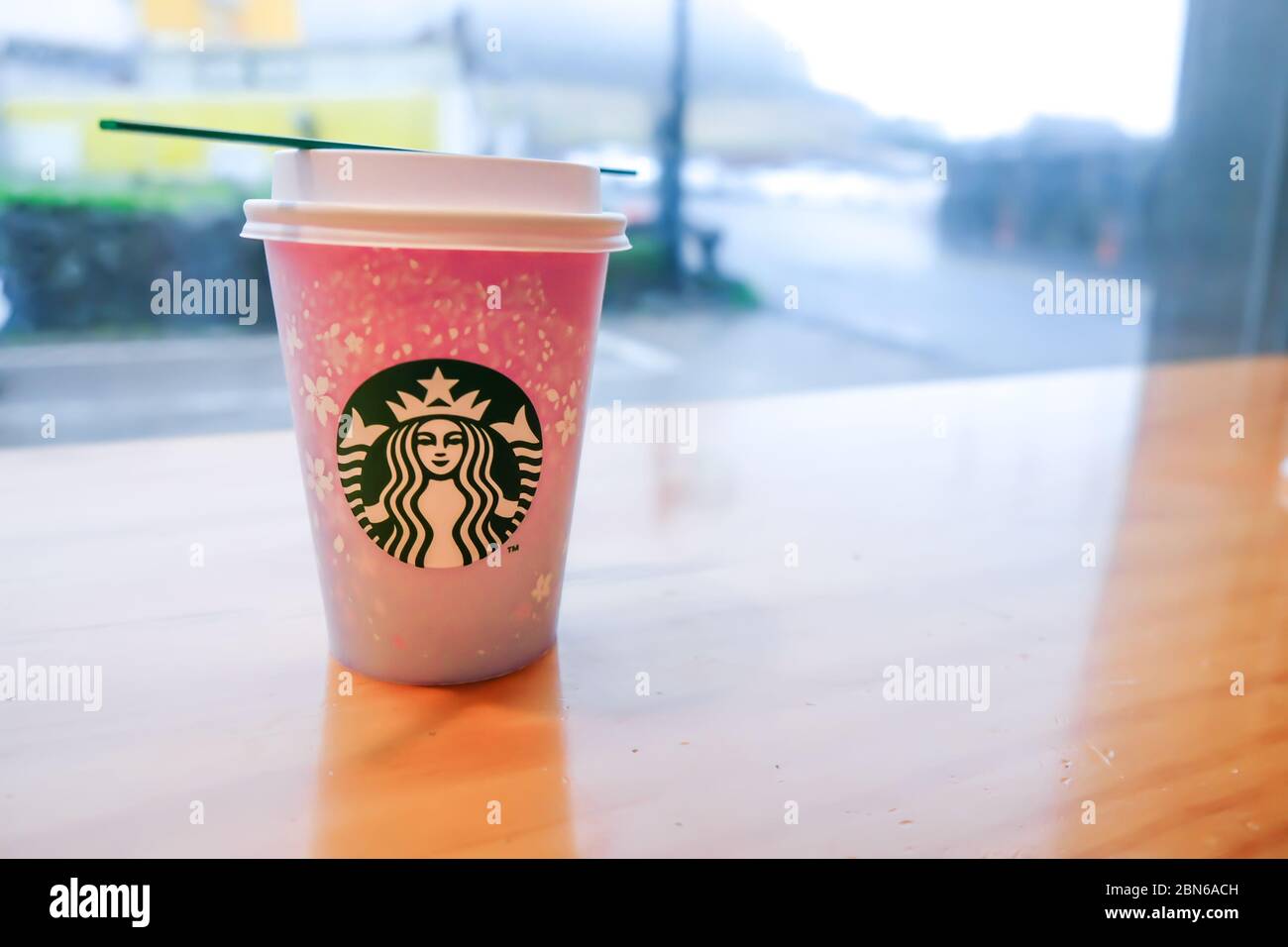 JEJU ISLAND, SOUTH KOREA - APRIL 6, 2017: Special edition Starbuck cups with cherry blossoms pattern for cherry blossom latte beverages Stock Photo