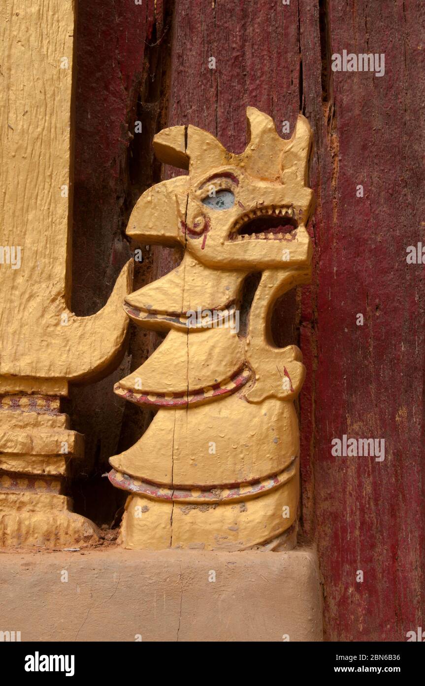 Burma / Myanmar: Naga (mythical serpent) ornamentation on a wall in the 18th century Buddhist temple of Wat Ban Ngaek temple, Kyaing Tong (Kengtung), Stock Photo