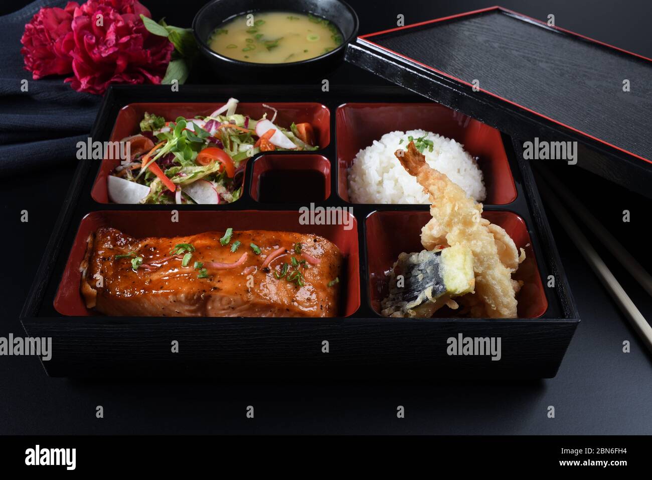 Fresh Food Portion in Japanese Bento Box with Sushi Rolls, Salad and ...
