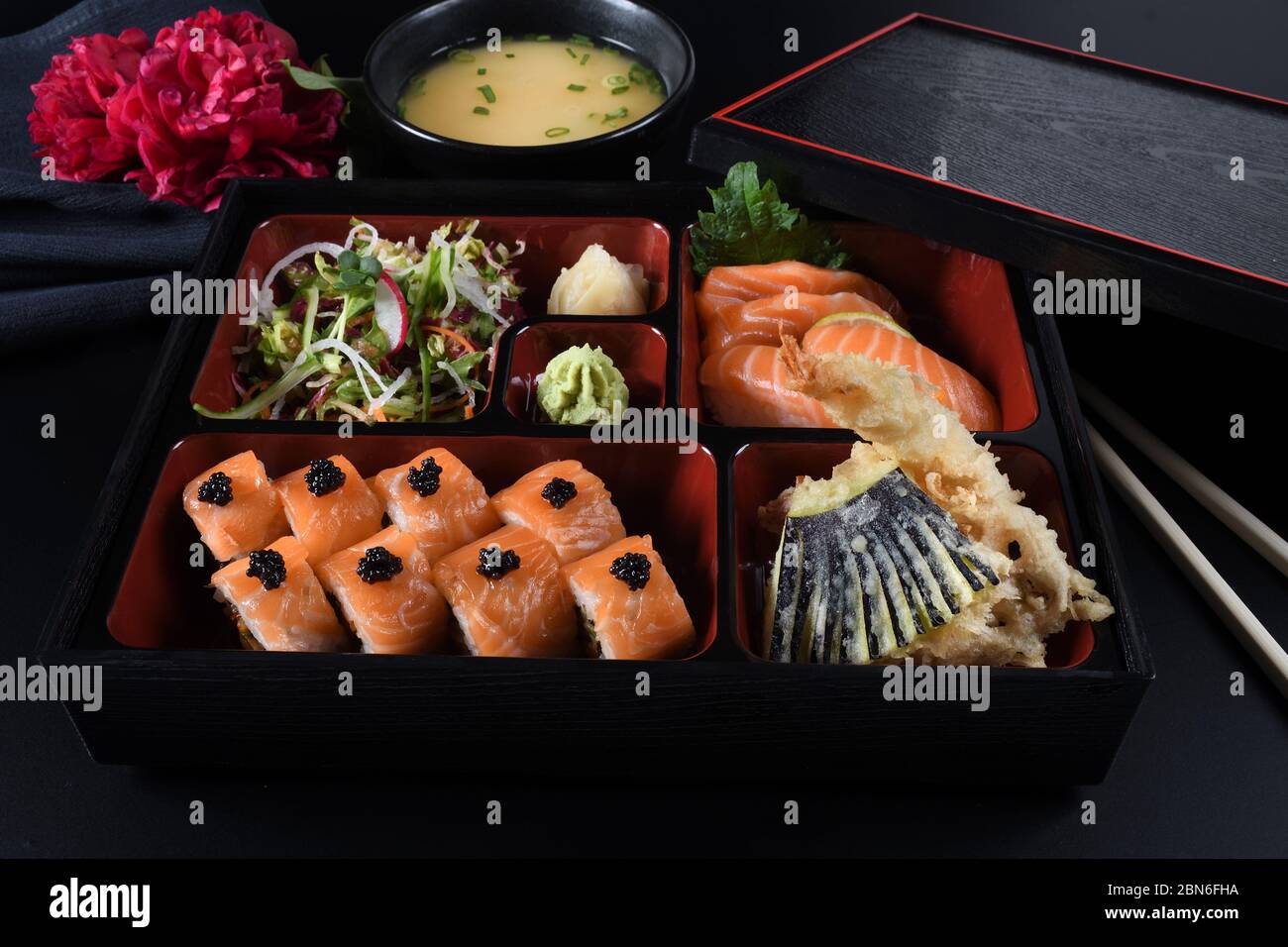 Fresh Food Portion in Japanese Bento Box with Sushi Rolls, Salad and ...