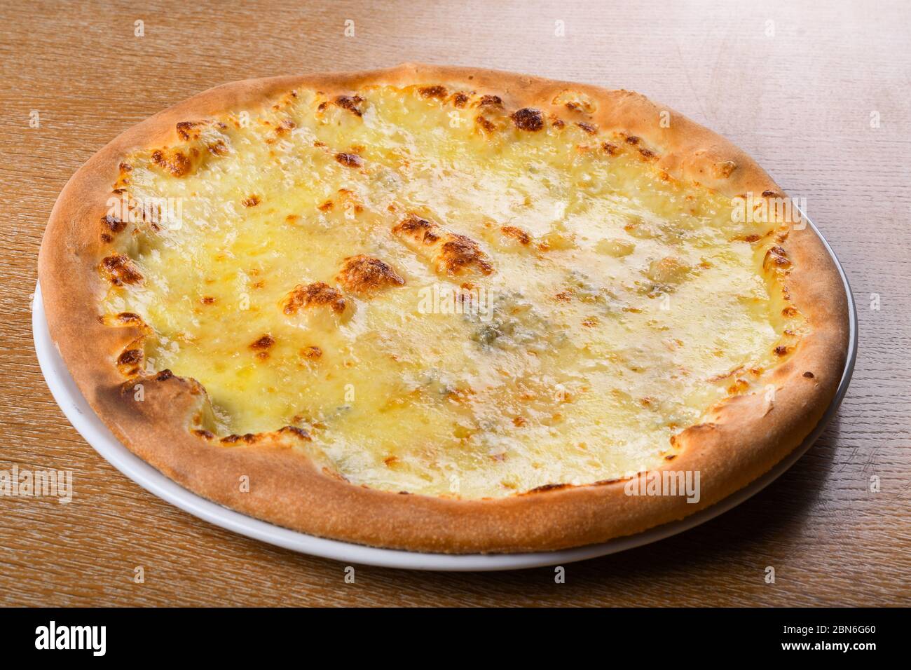 Quattro formaggi is a variety of Italian pizza topped with a