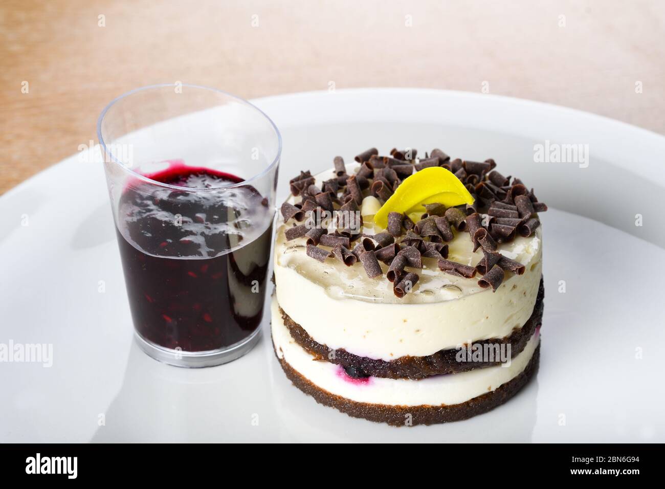 Panna Cotta Mini Cake With Berry Topping Panna Cotta Is An Italian Dessert Of Sweetened Cream Thickened With Gelatin And Molded The Cream May Be Aro Stock Photo Alamy
