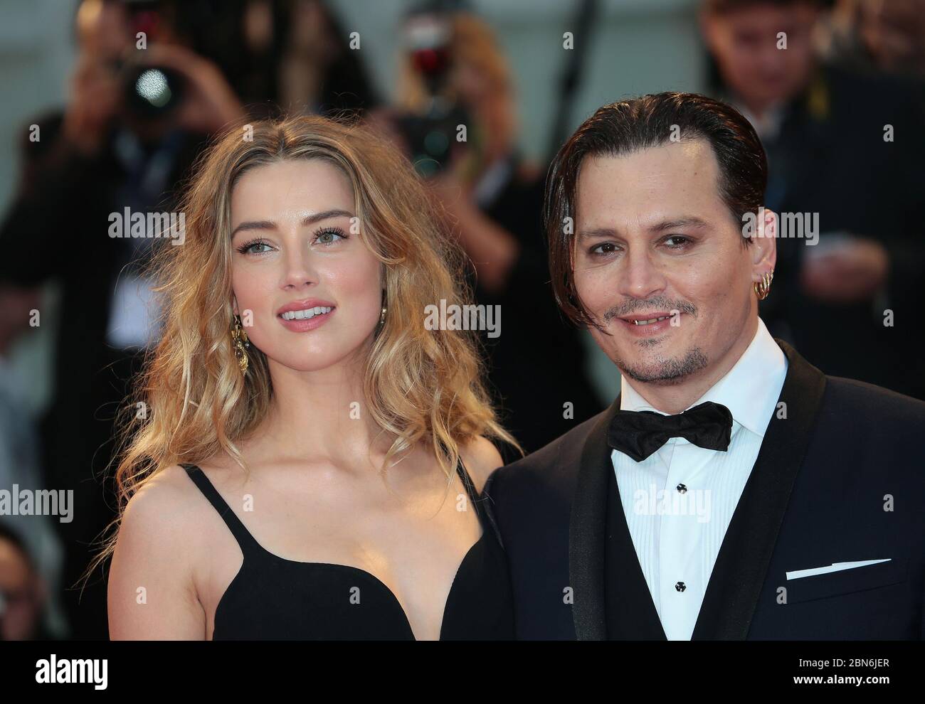 Johnny Depp and Amber Heard attends the 'Black Mass' red carpet during