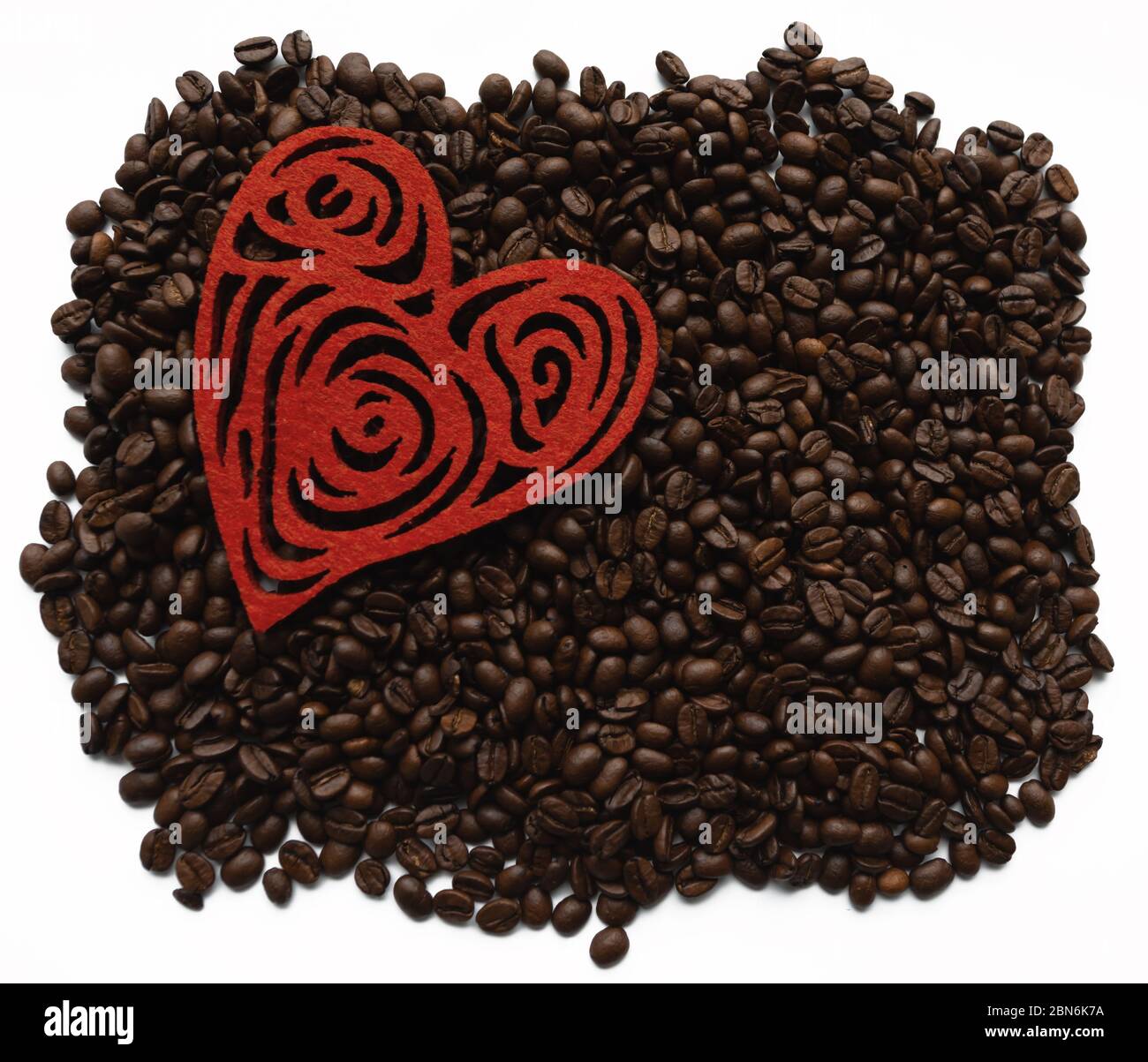 Coffee beans lying on white isolated background Stock Photo